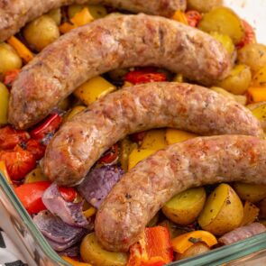 Baked Italian Sausage in a baking dish.