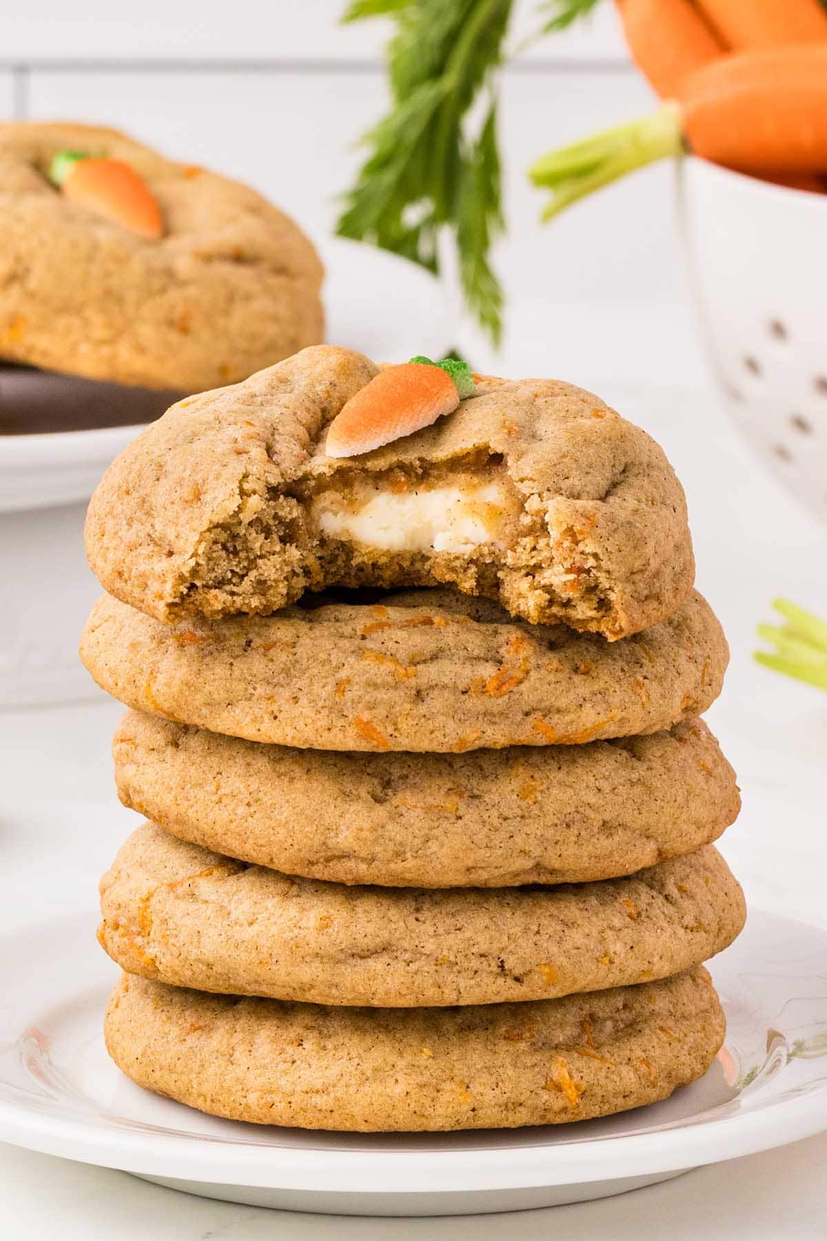 a couple of Carrot Cake Stuffed Cookies with cream cheese filling.