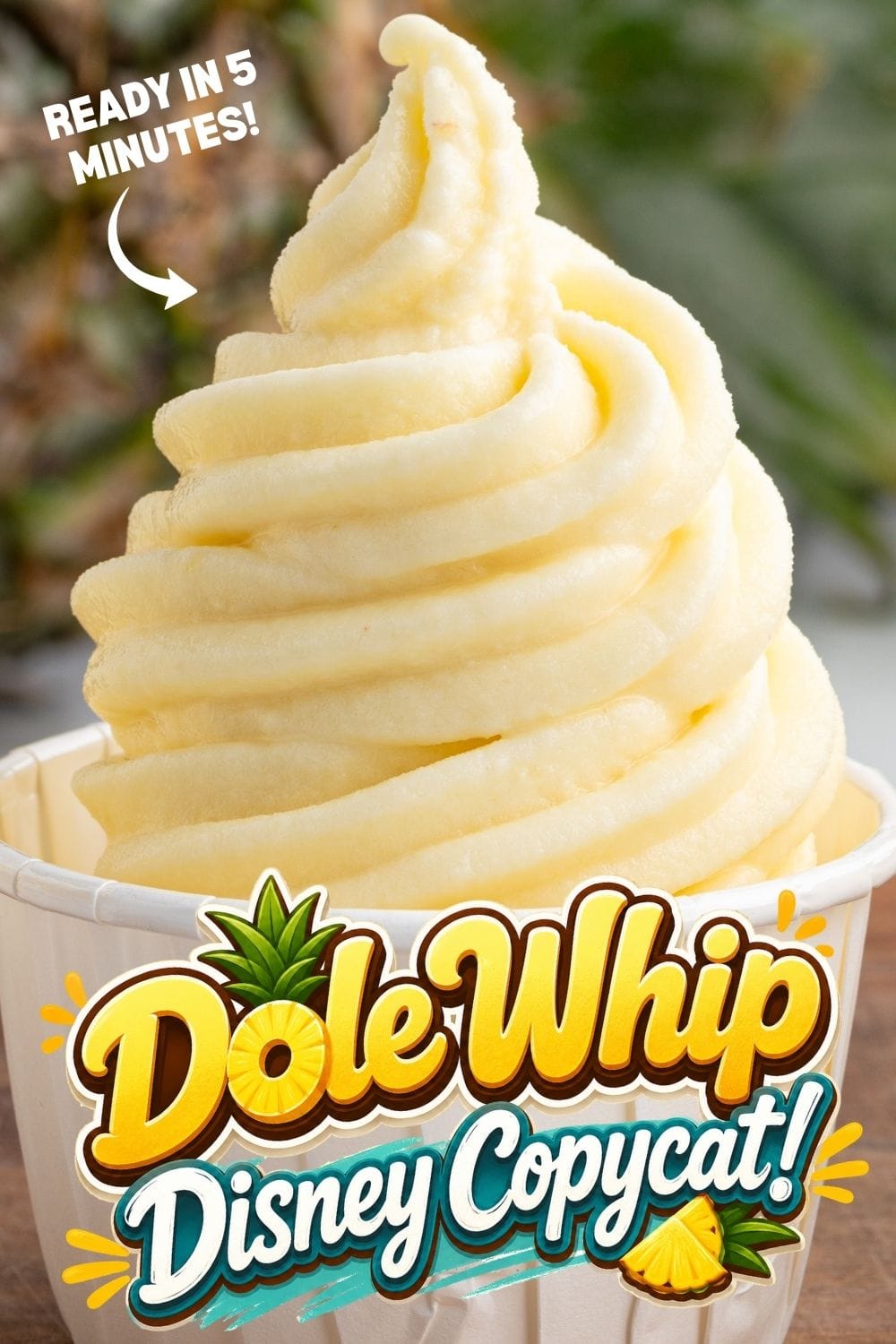 Swirled pineapple Dole Whip in a paper cup, a 5-minute Disney copycat recipe.