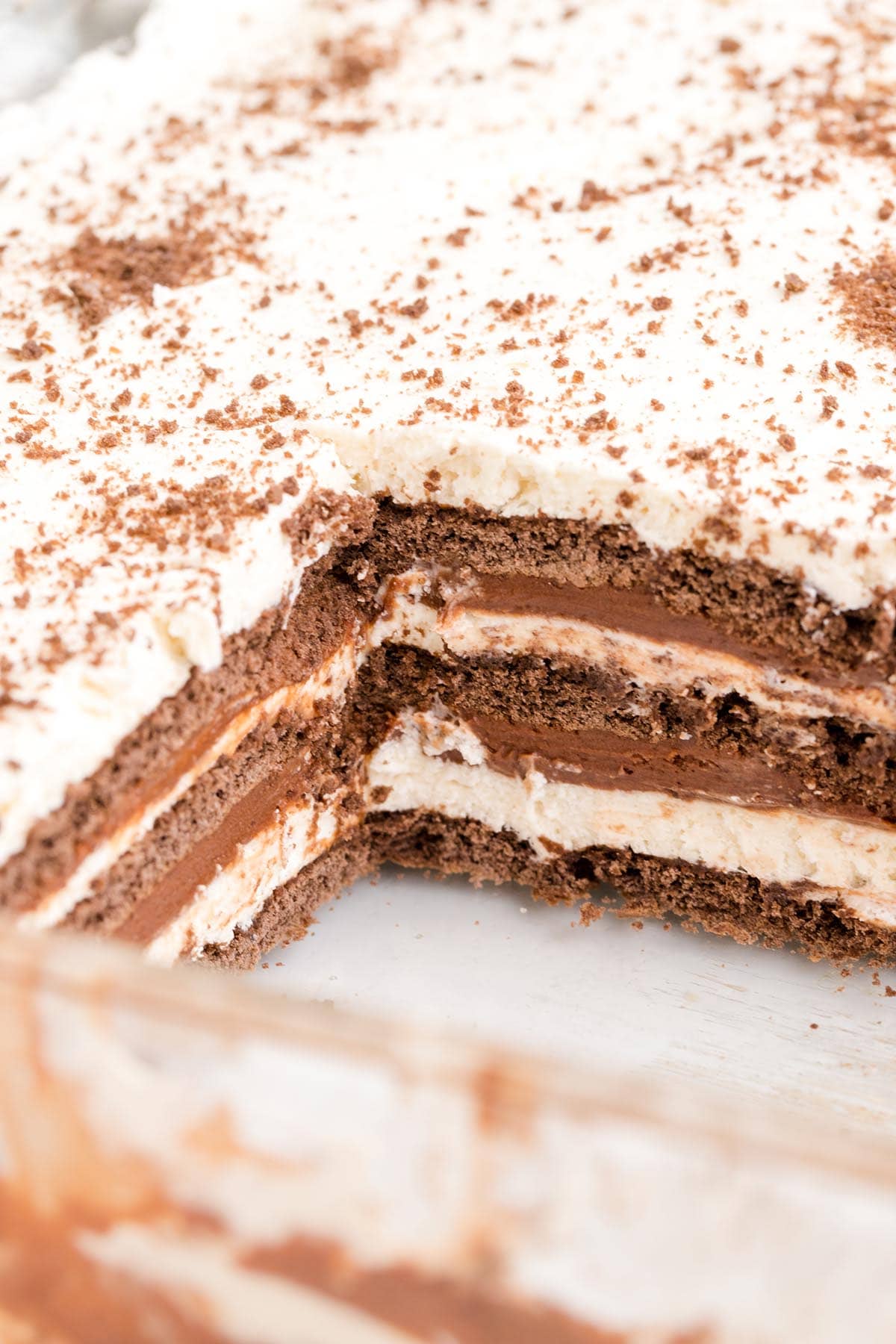 chocolate graham crackers icebox cake inside carrousel pan.