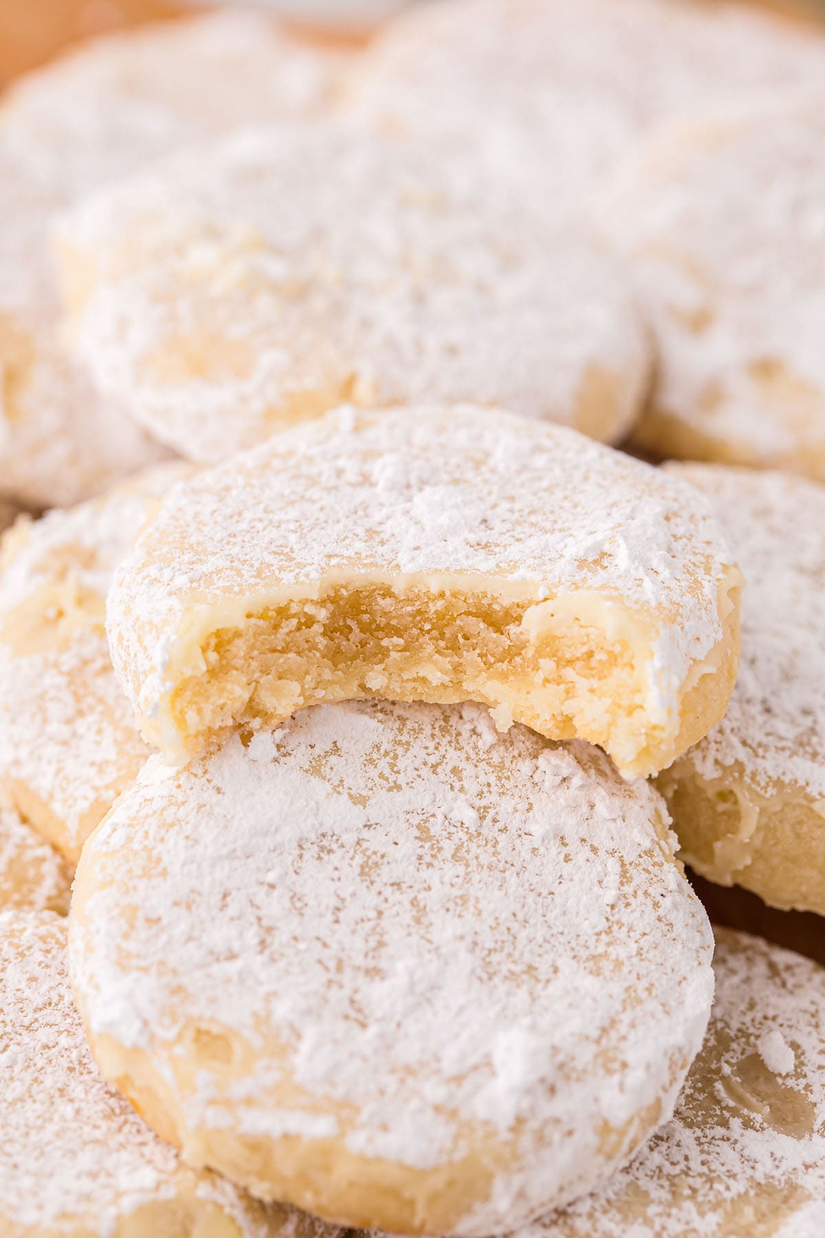 a couple of Lemon Cooler Cookies stacked up, with one partially eaten.