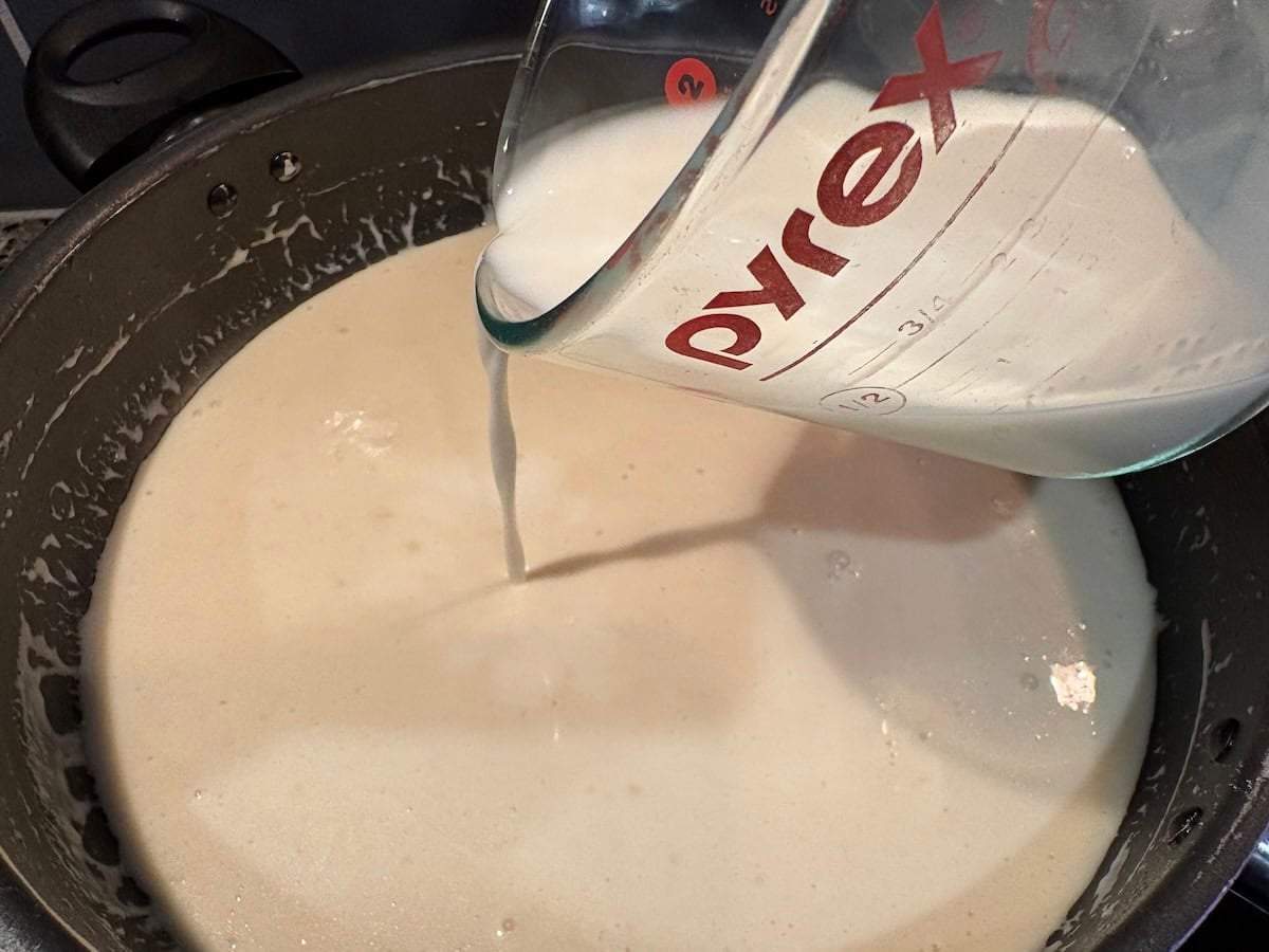 adding cream to butter mixture
