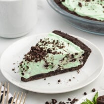 a slice of mint chocolate pie on a plate.