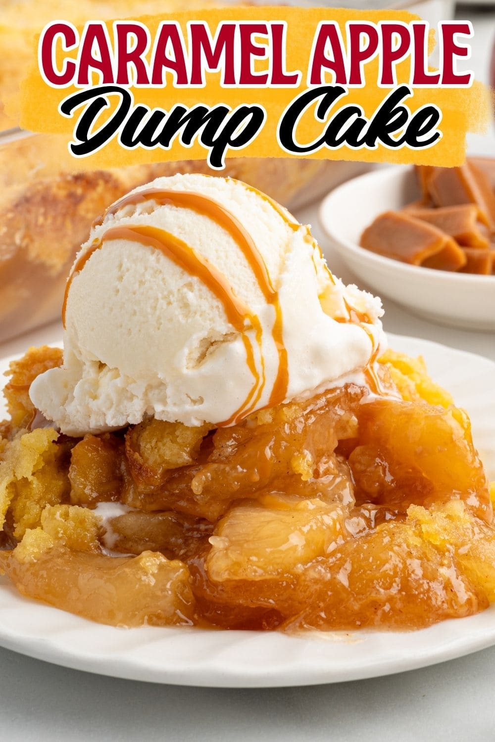 Caramel apple dump cake topped with vanilla ice cream and caramel drizzle on a plate.