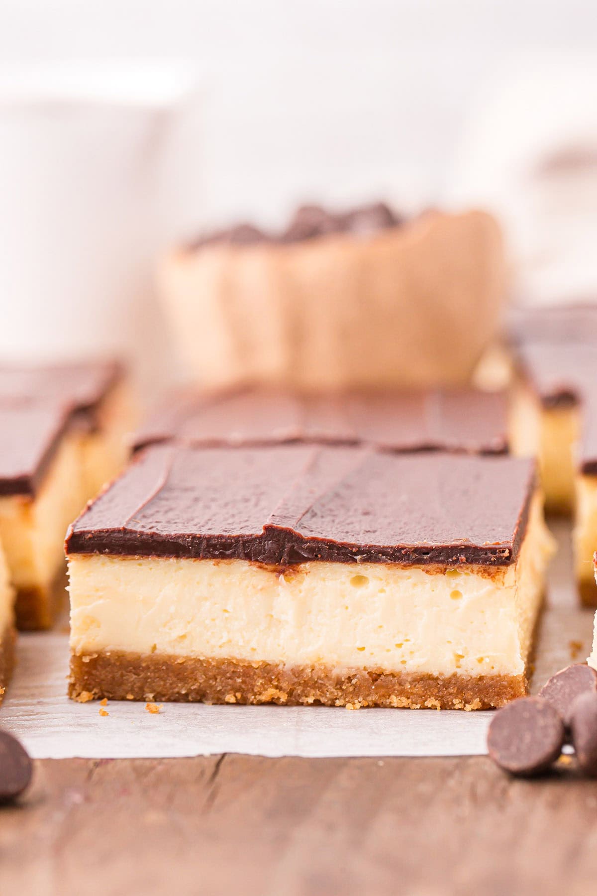 Cheesecake Bars with a chocolate ganache. 