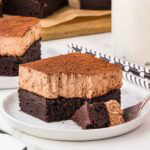 a slice of Chocolate Mousse Brownies on a white plate.