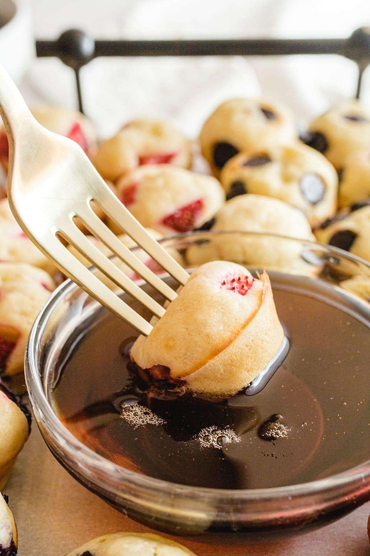 dip mini pancake in a syrup. 