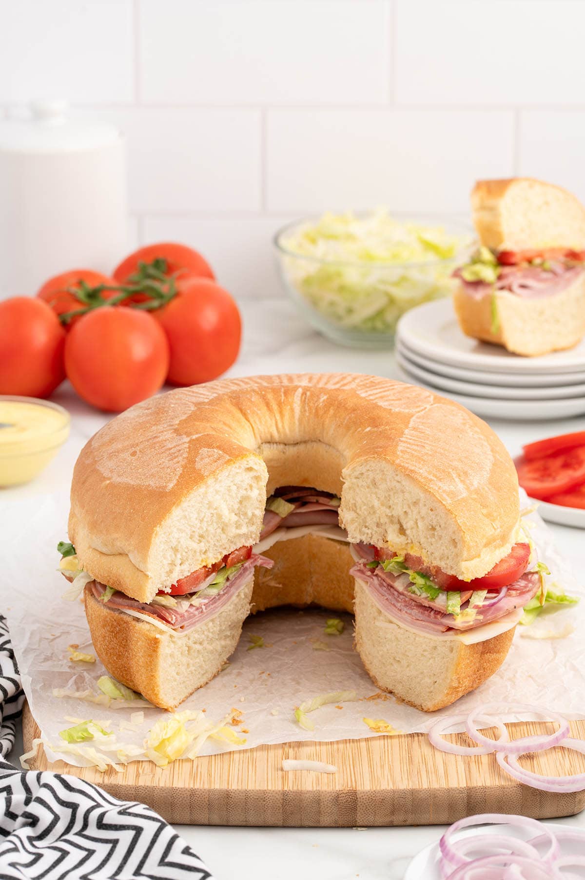 party sub placed on top of wooden board. 