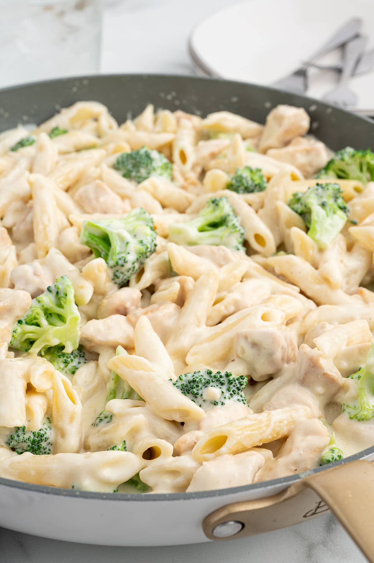 Chicken and Broccoli Penne Alfredo in a pan.