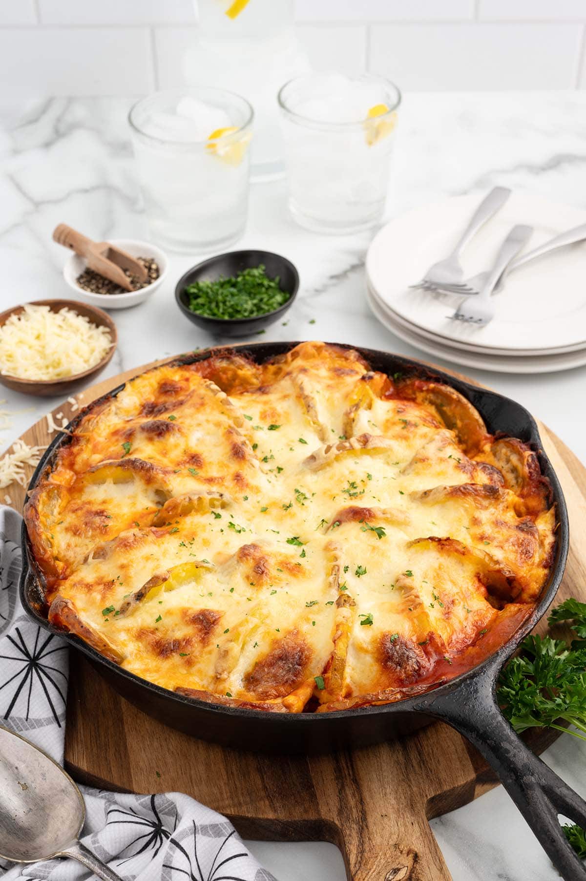 meatball and potatoes in a skillet. 