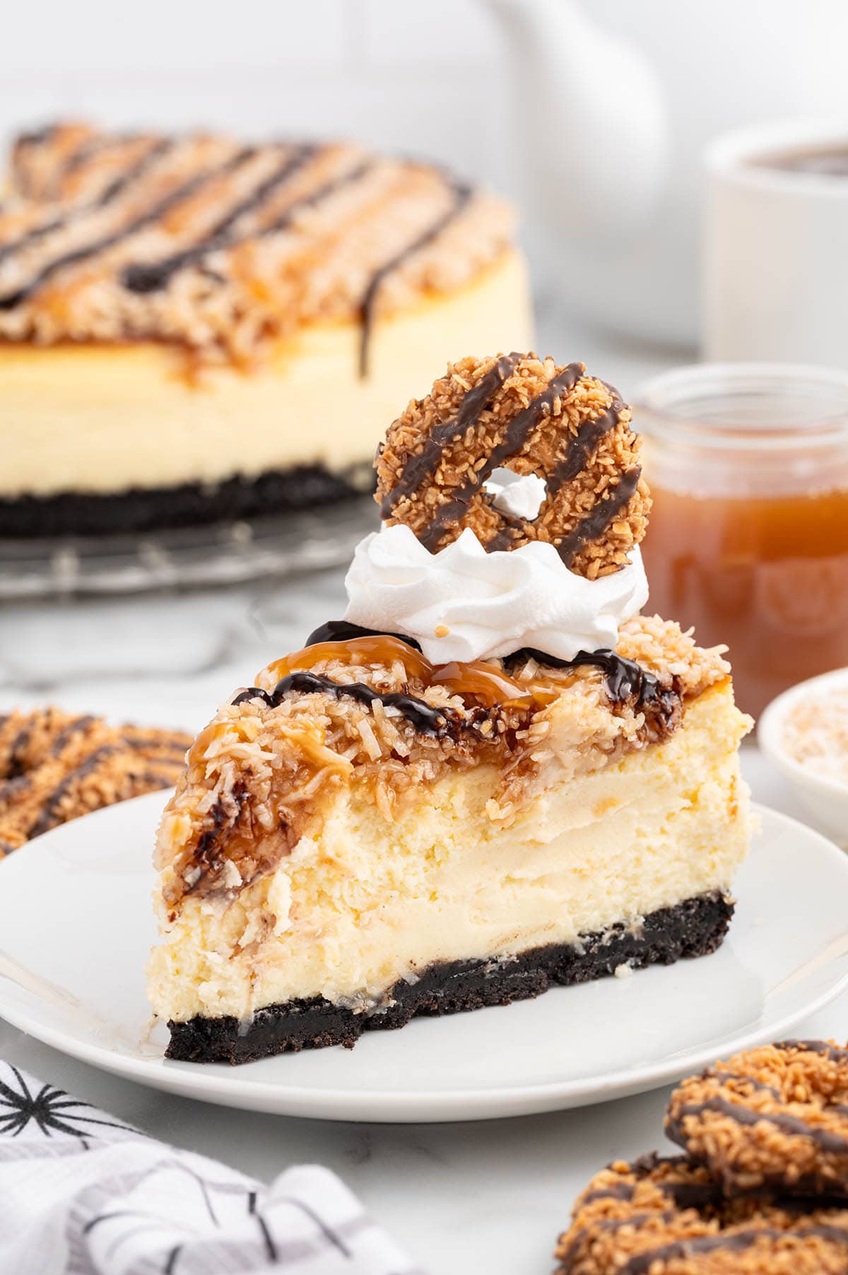 samoa cheesecake with cookies on top. 