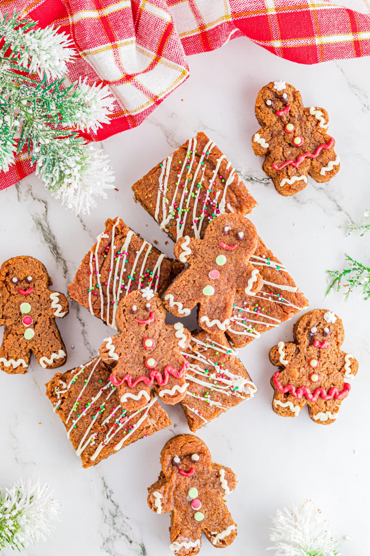 a couple of gingerbead blondies on top of white table. 