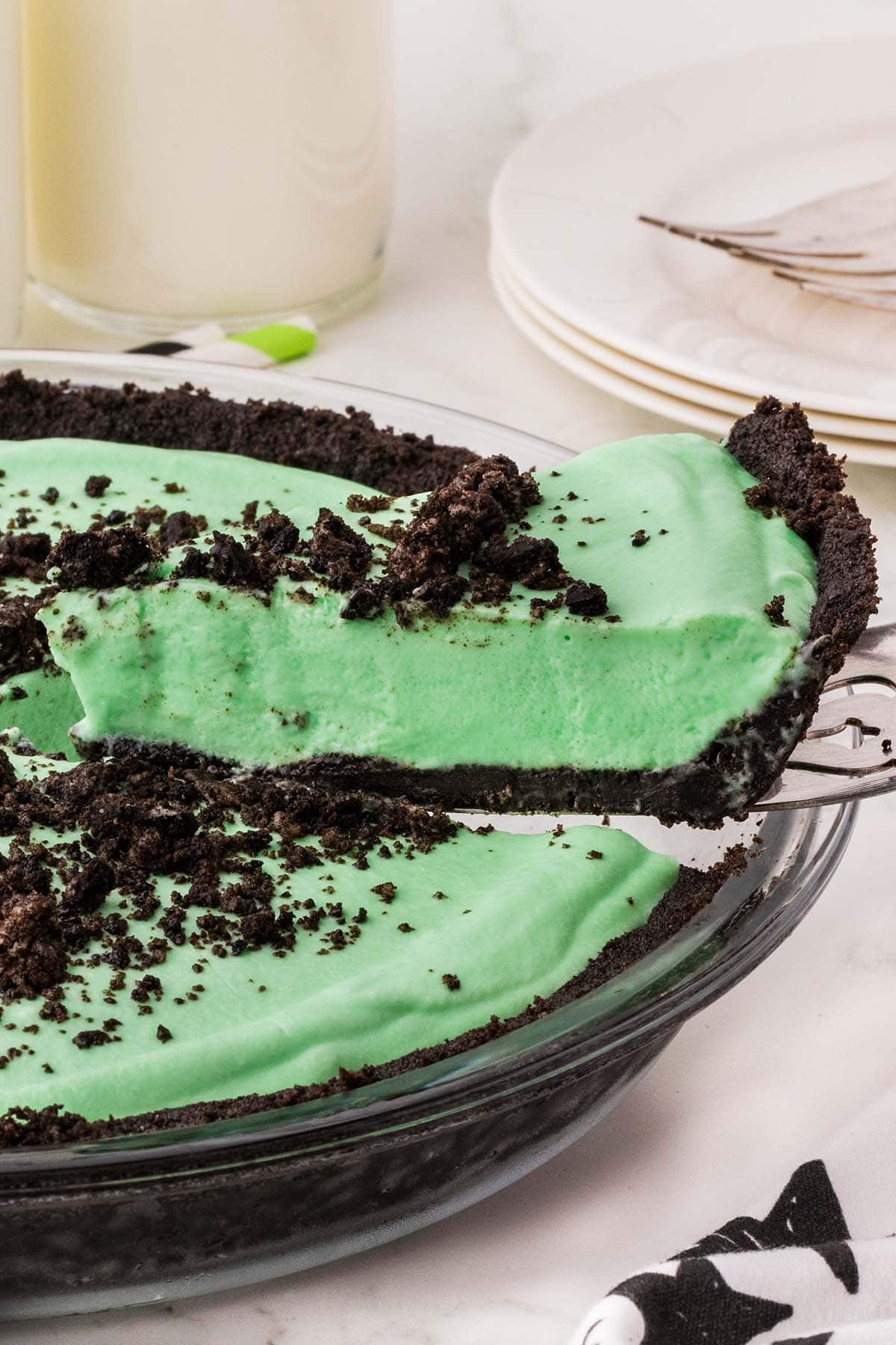 a slice of grasshopper pie topped with Oreo cookies.