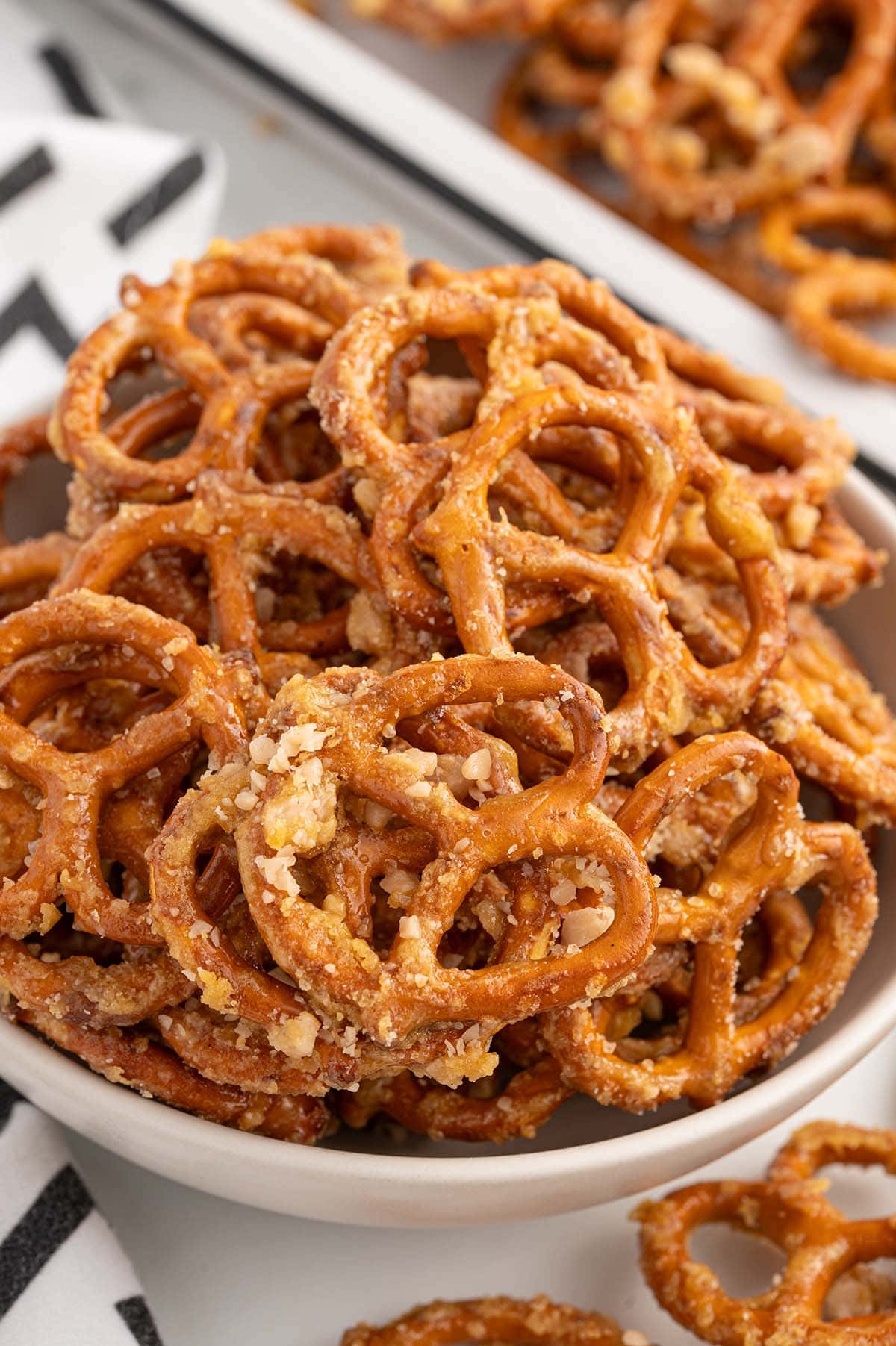 butter toffee pretzels on a plate.