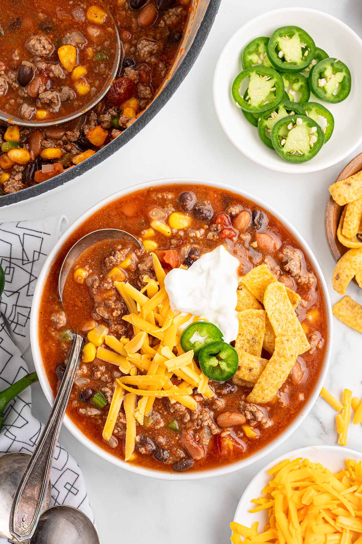 taco soup served in a white bowl.