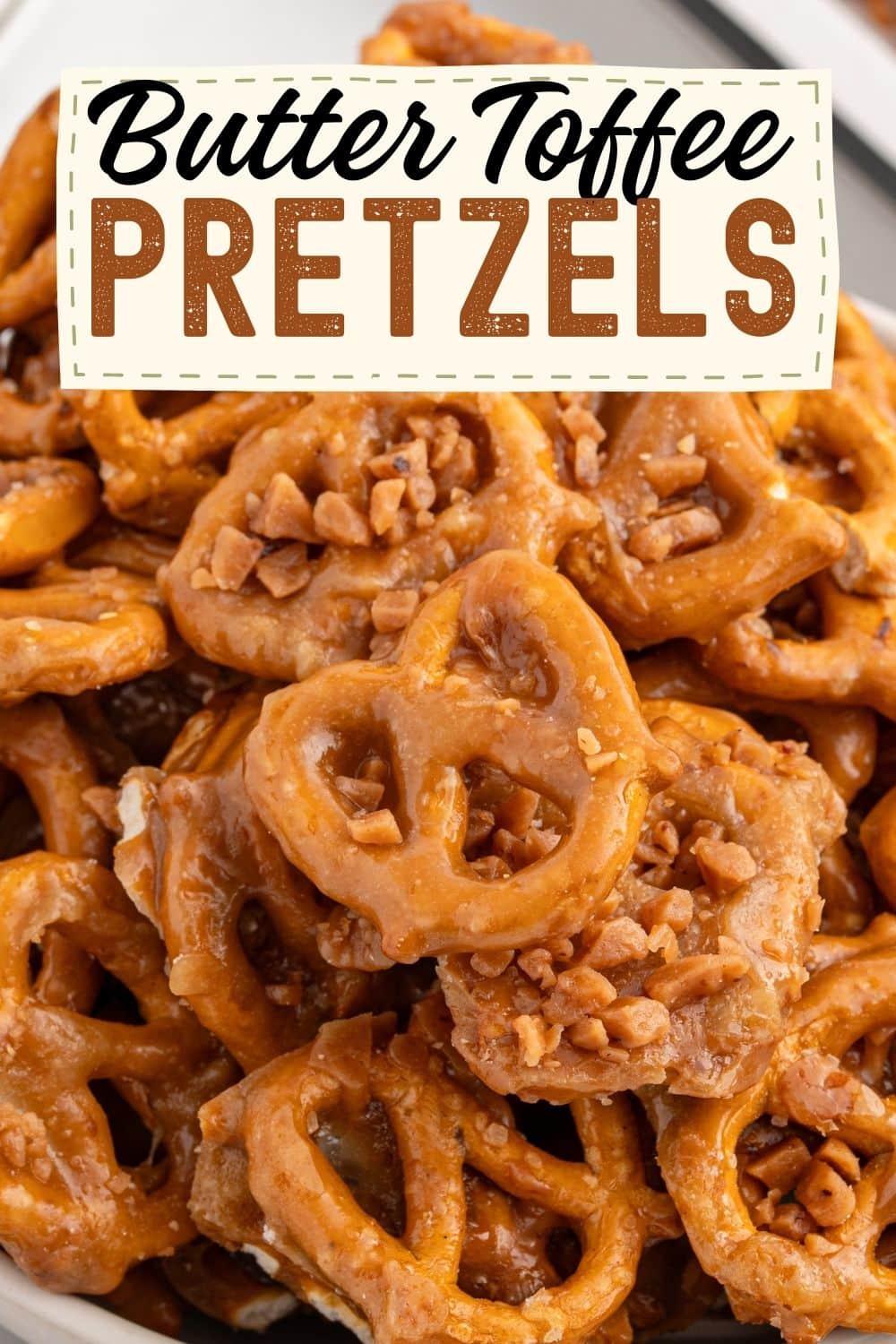 Close up of butter toffee pretzels coated in sweet buttery toffee, served as a holiday snack mix