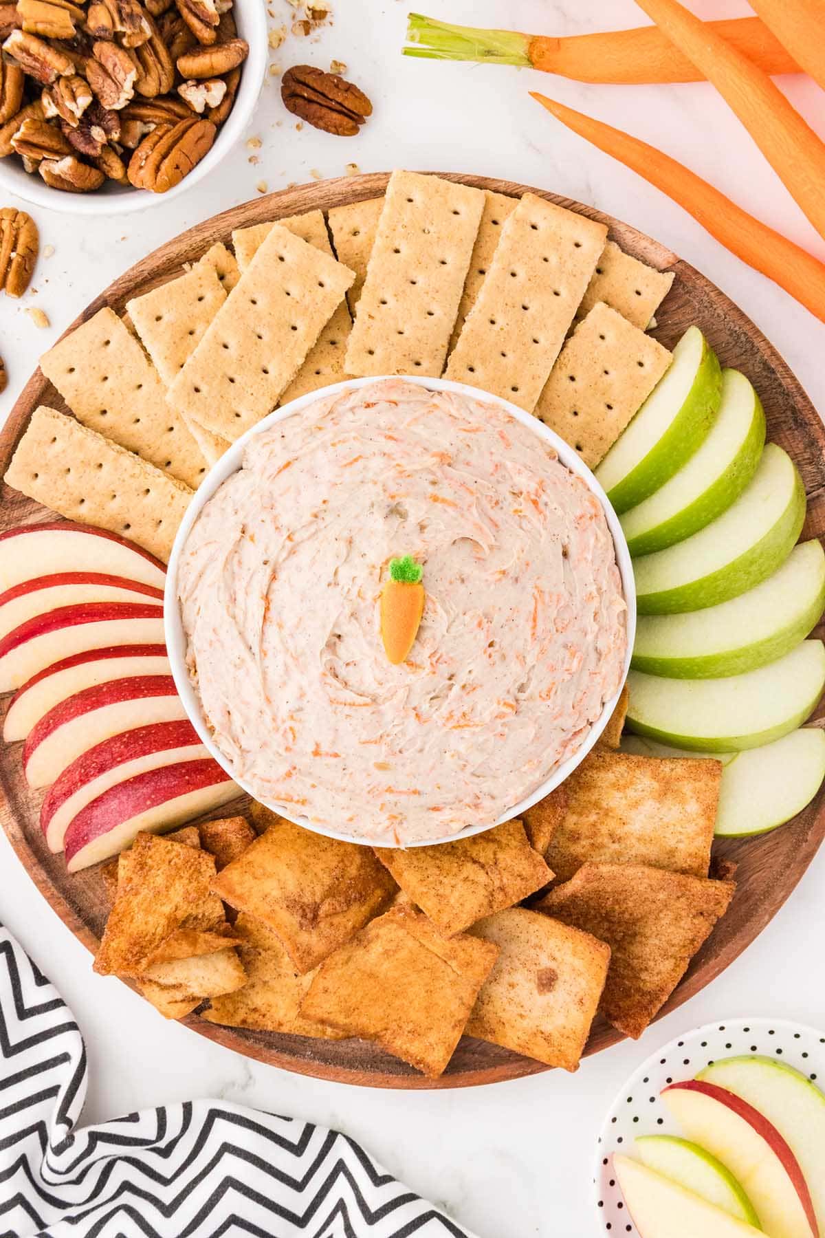 Carrot cake dip with graham crackers, apples, and cinnamon chips.