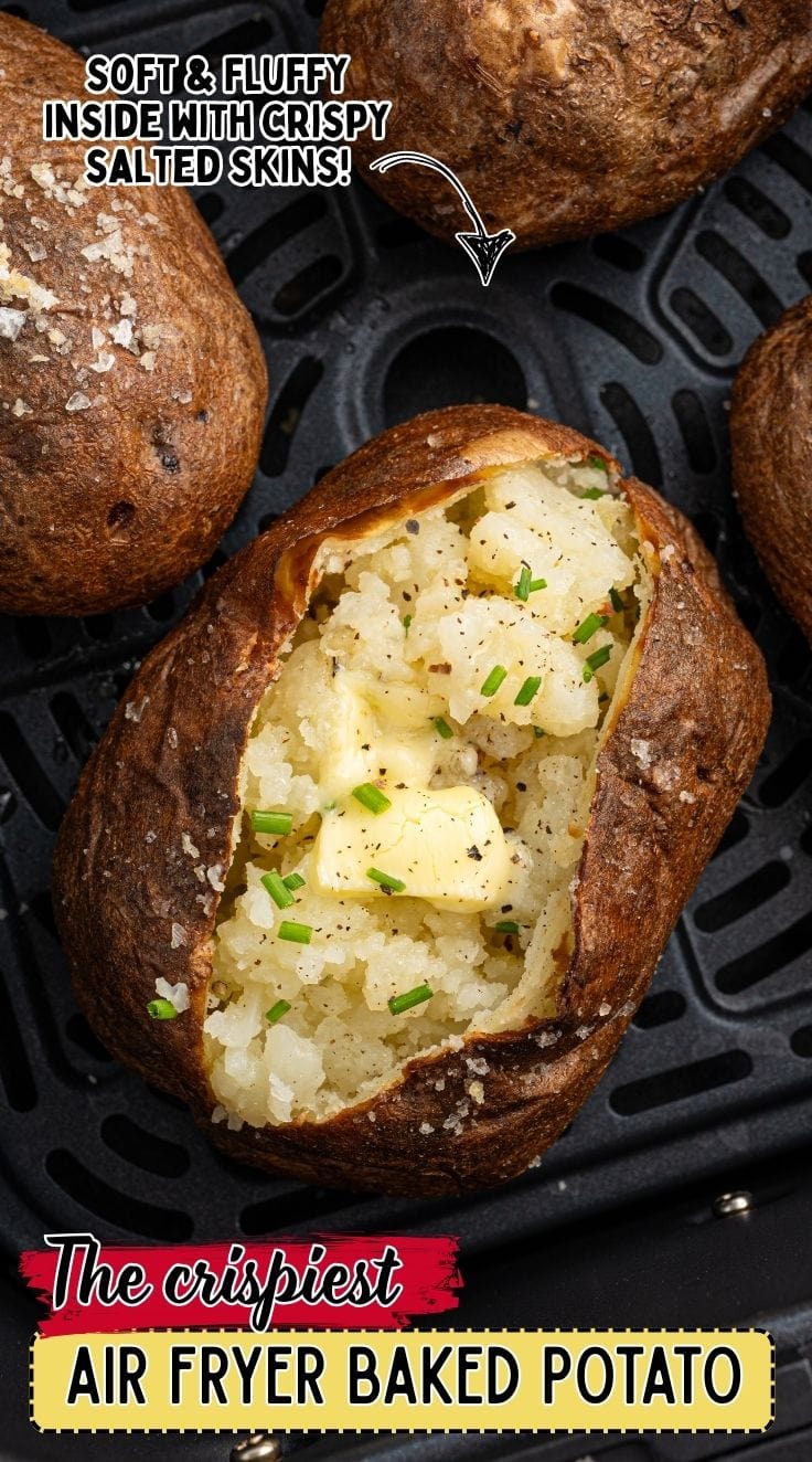 Air fryer baked potato with crispy skin and fluffy inside in an air fryer basket.