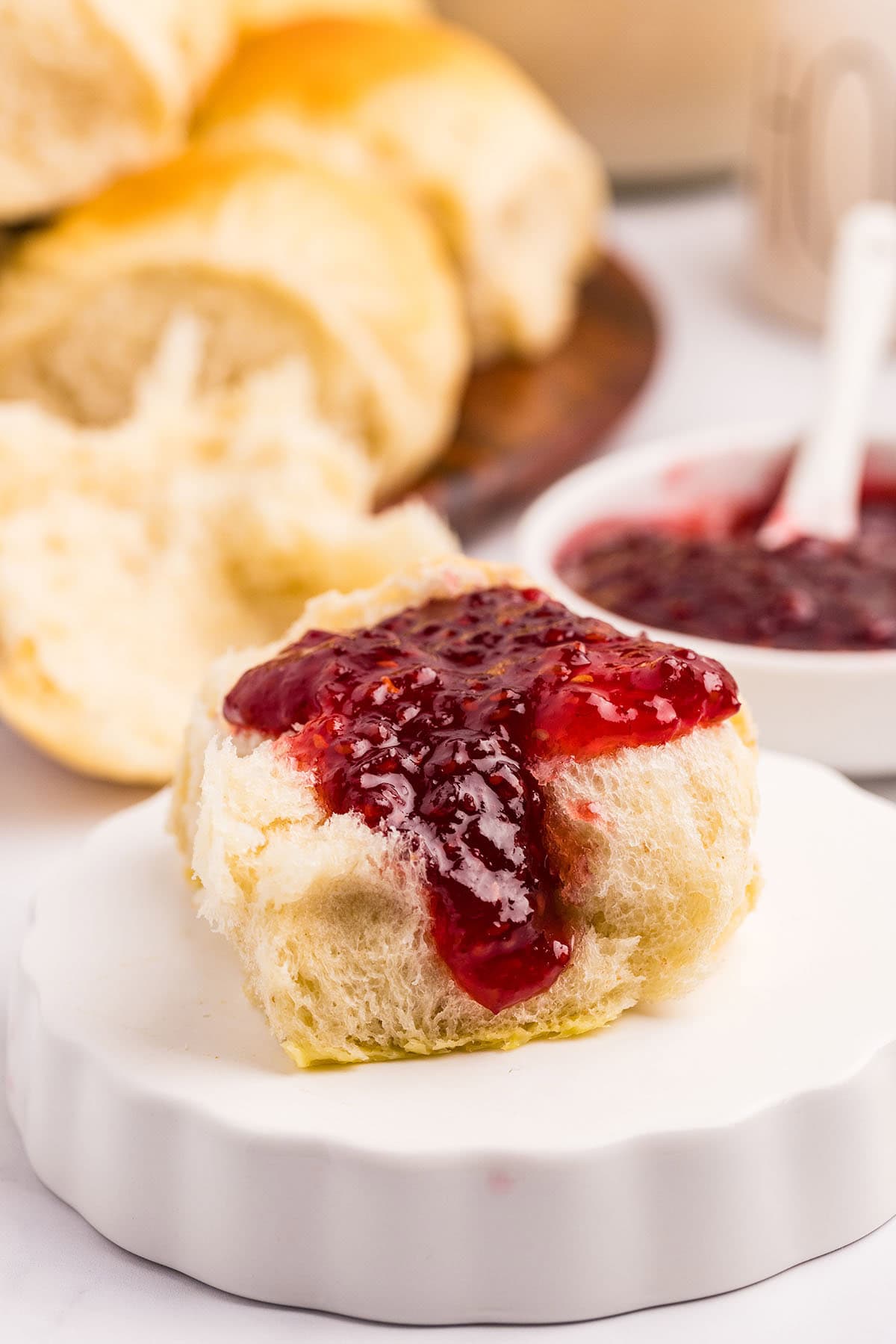 sourdough discard rolls with strawberry jam. 