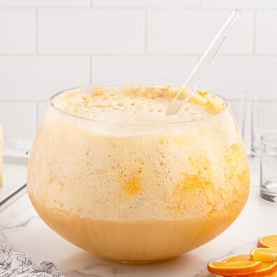 Orange Dreamsicle Punch in a glass bowl.