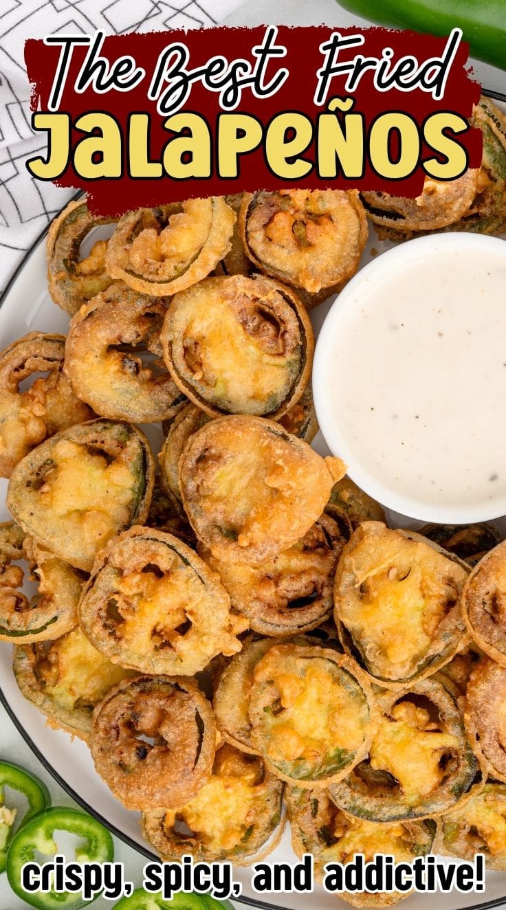 Crispy Fried Jalape&ntilde;os served on a plate with a bowl of dipping sauce .