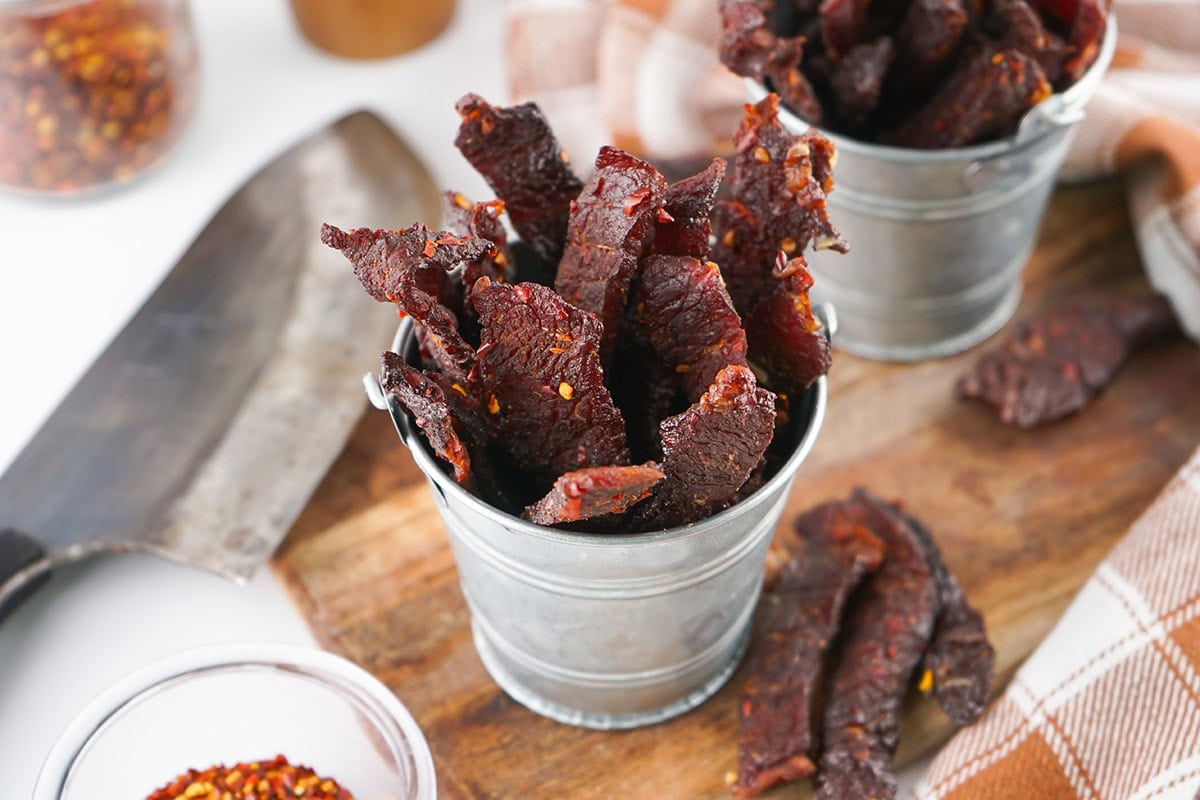 Smoked Beef Jerky inside 2 metal basket. 