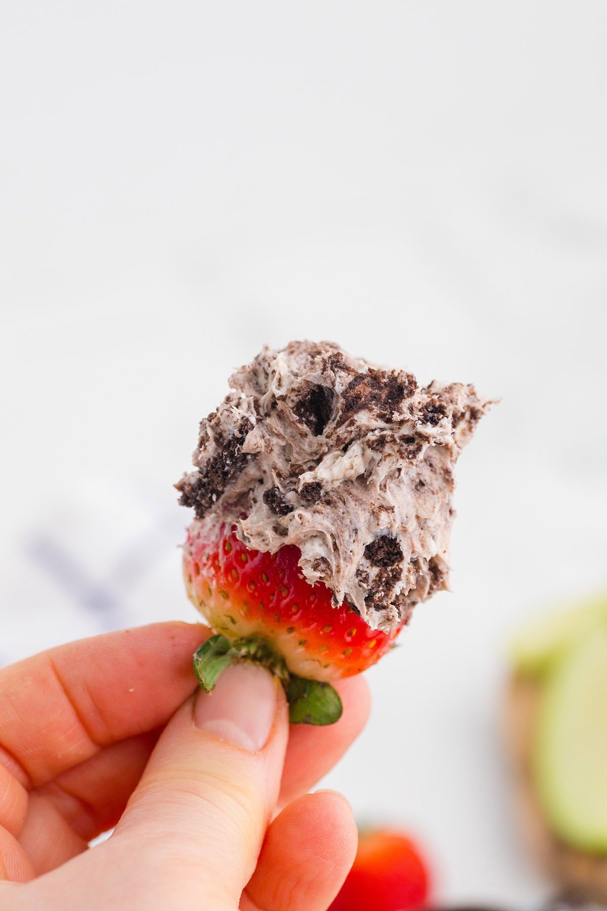 Strawberry dipped in Oreo Dip.