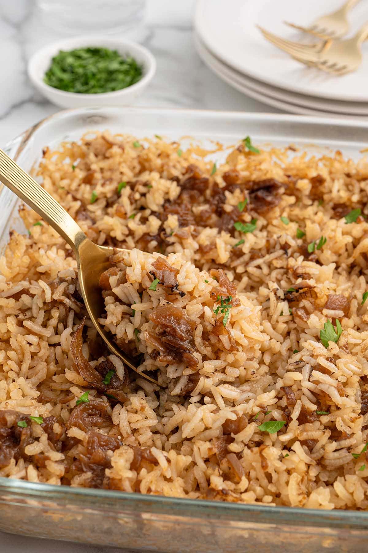 French Onion Rice with caramelized onions and fresh parsley.