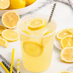 lemonade in a cup with straw.