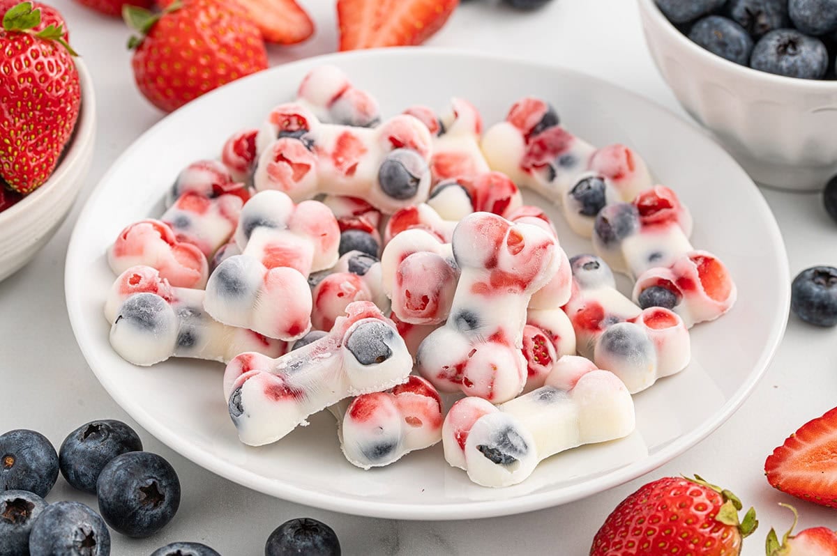 a plate full of yogurt dog treats. 