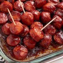 sausage bites inside baking dish with toothpick in some of them.