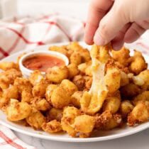 cheese curds on a plate.