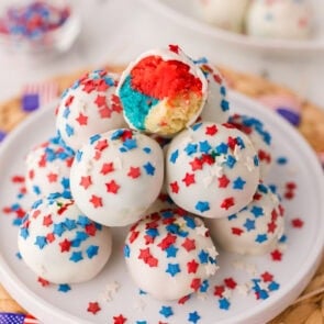 Red, white, and blue cake bombs with star sprinkles and a colorful layered center.