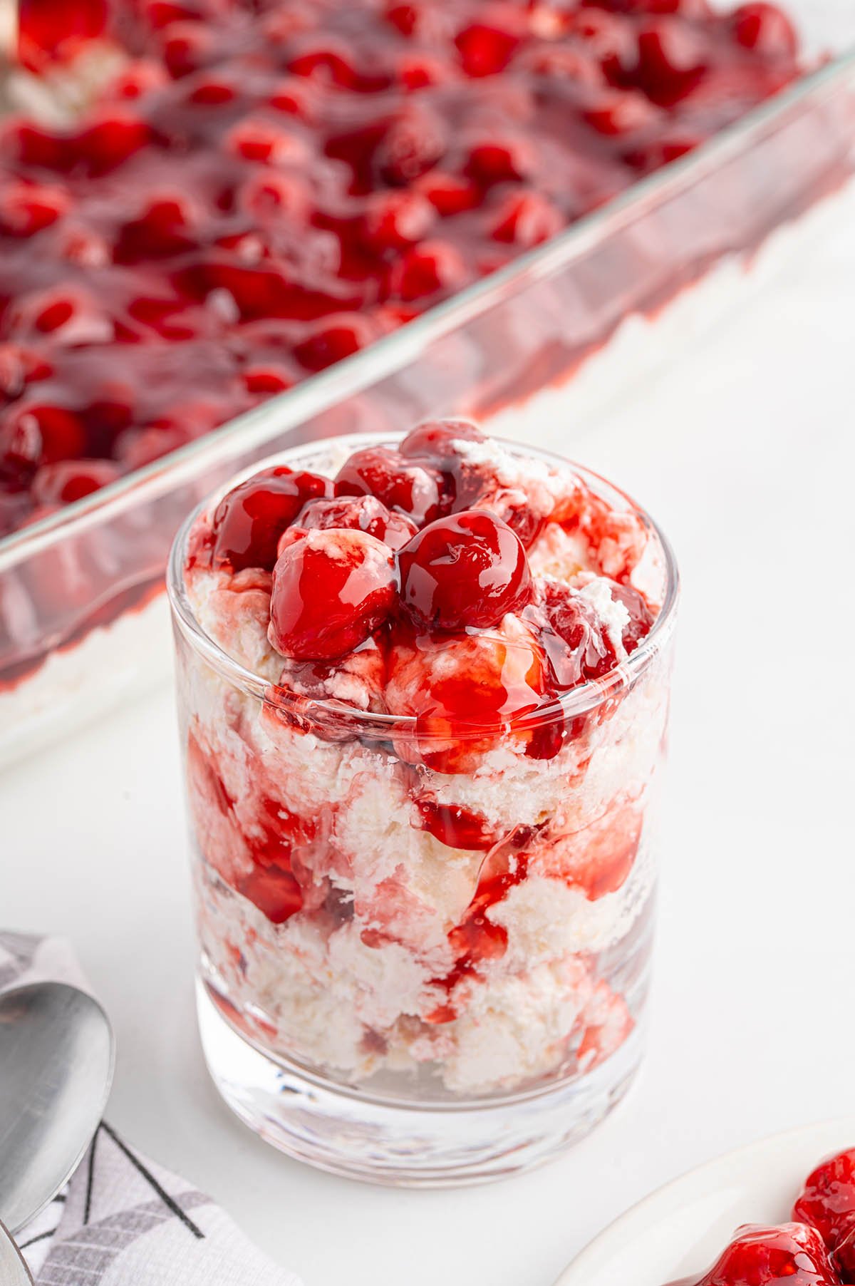 cherries in the snow served in a glass