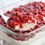 cherries in the snow inside casserole dish.