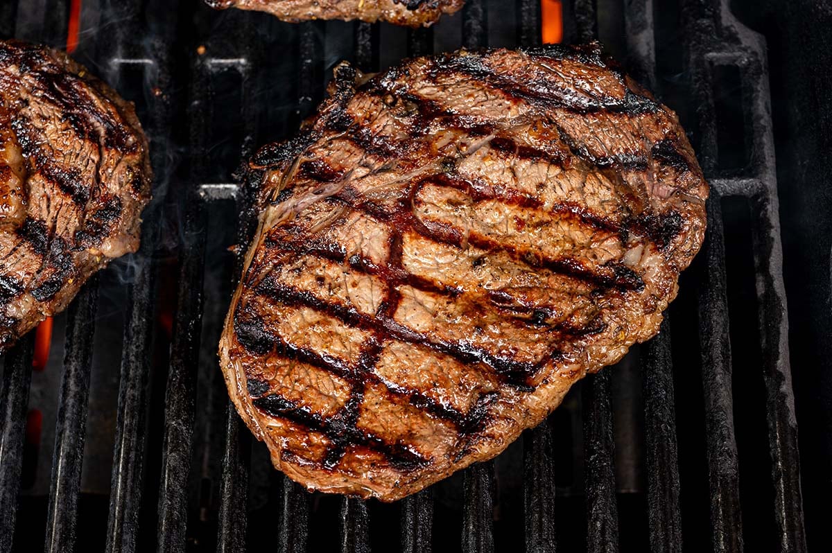 steak marinade on a grill.