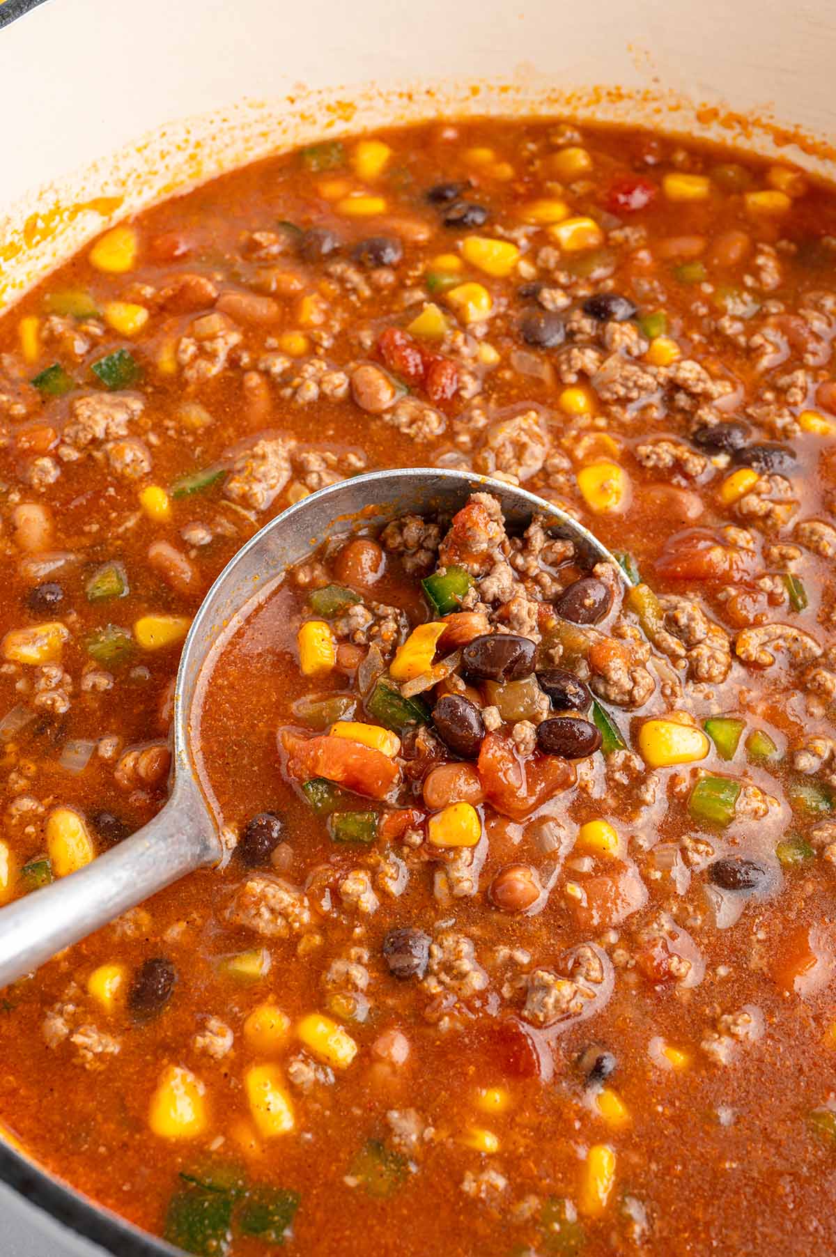 taco soup in a big pot with a laddle.