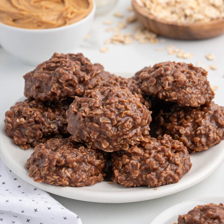 a couple chocolate peanut butter no bake cookies on top of the plate.