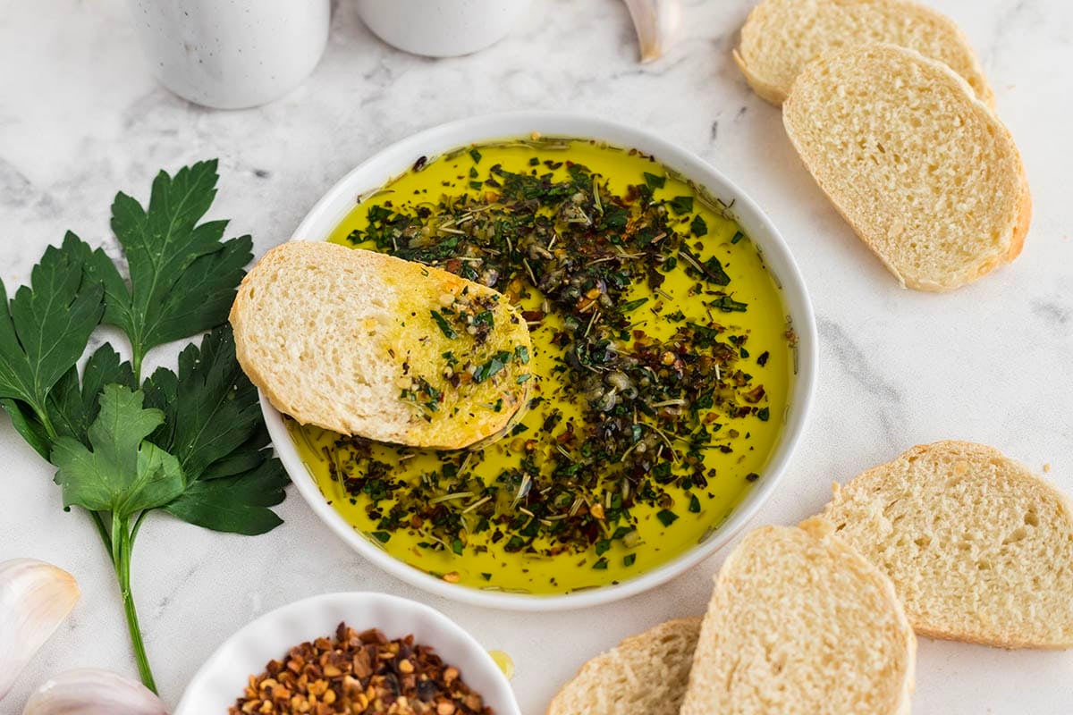 Slice of bread coated with an herbed olive oil mix.