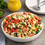 chickpea salad in a white bowl.