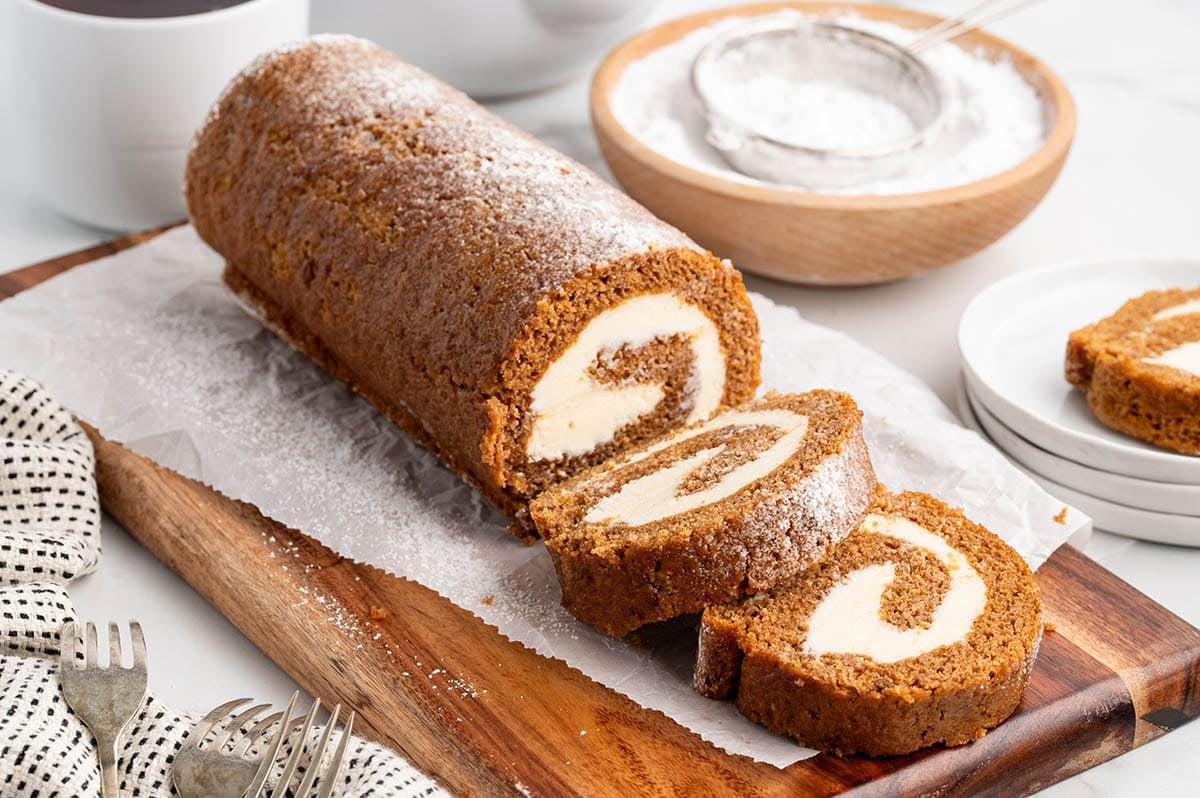 A moist pumpkin roll with a swirl of smooth cream cheese filling inside.