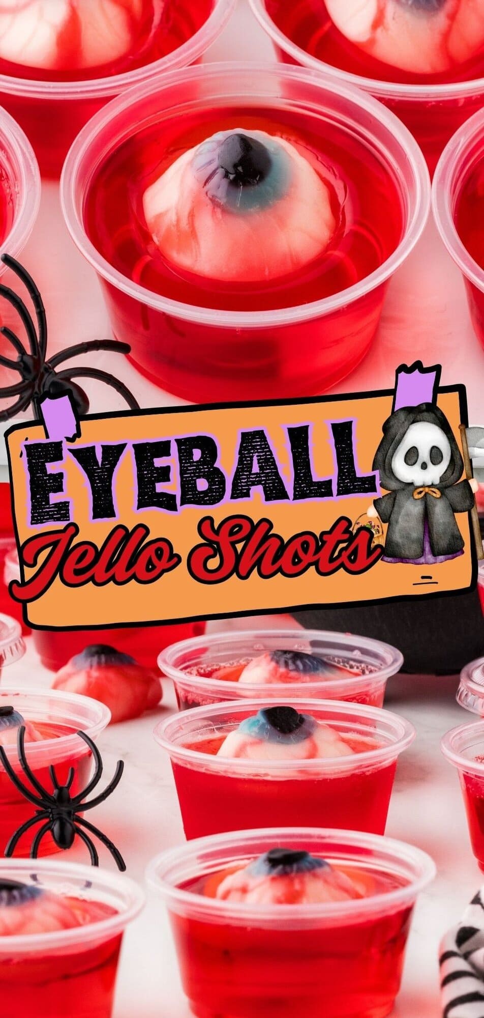 Close up of realistic eyeball jello shots in a cup with eyeball shaped candy