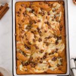 Pumpkin earthquake cake fresh out of the oven with melted chocolate chips on top.