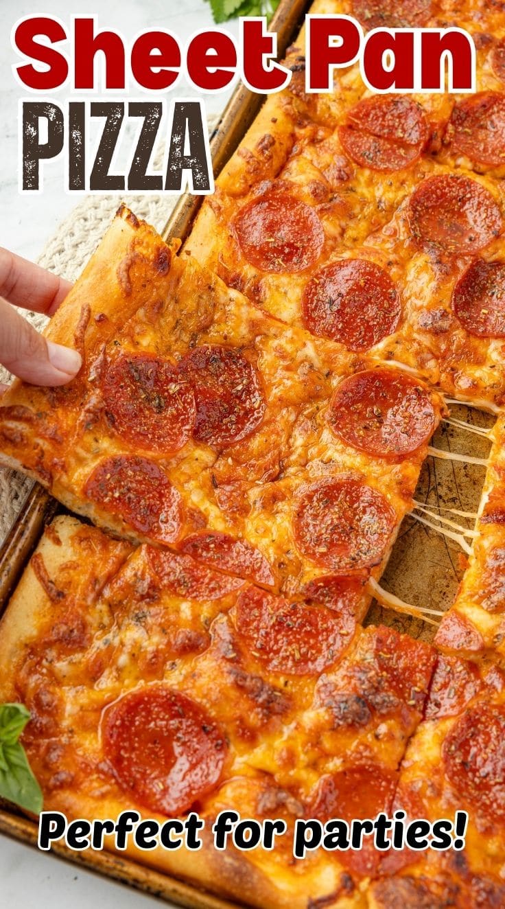 A hand pulling a piece of Sheet Pan Pizza topped with pepperoni from the baking pan