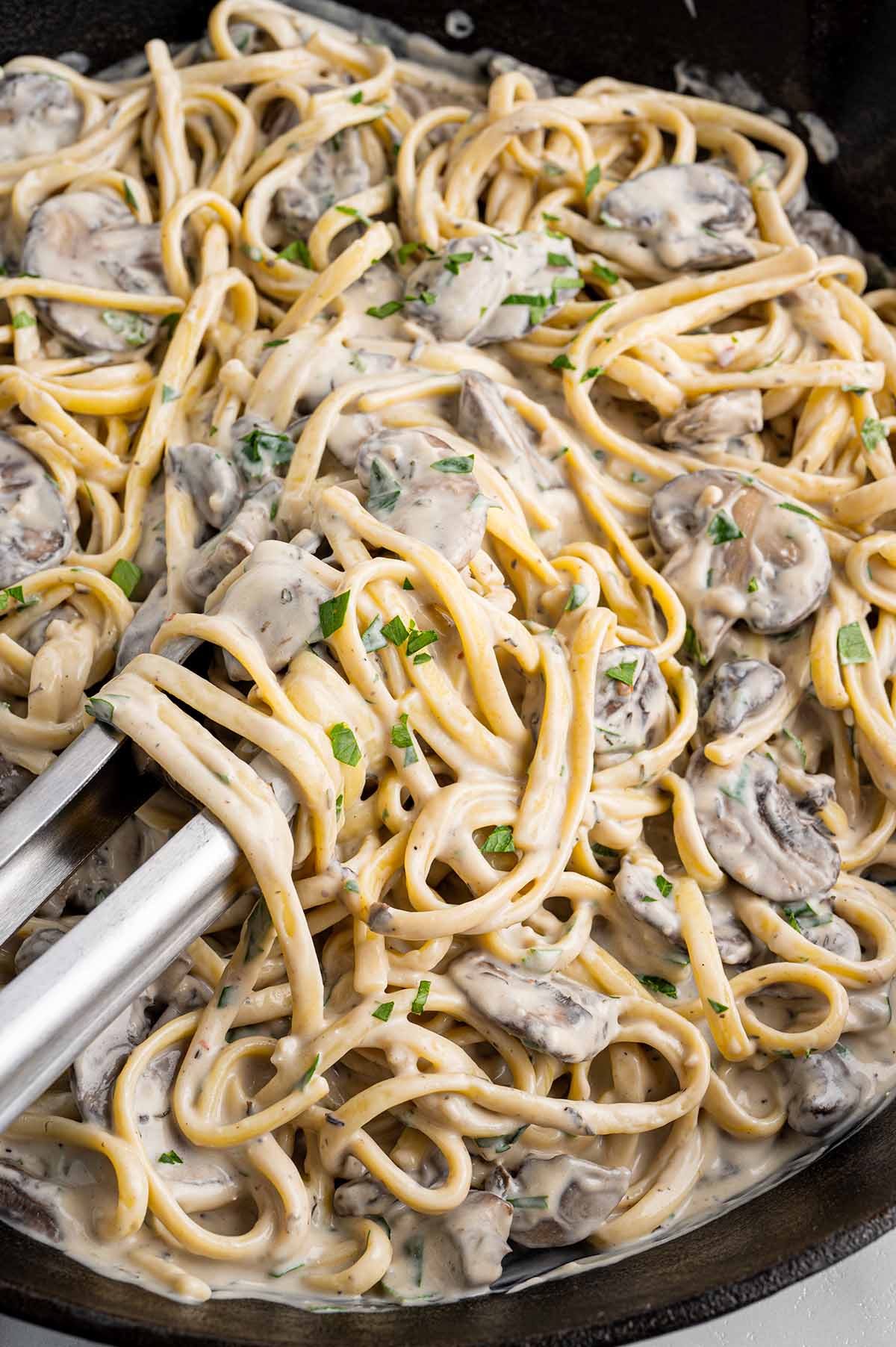 Creamy pasta mixed with sautéed mushrooms and fresh herbs.