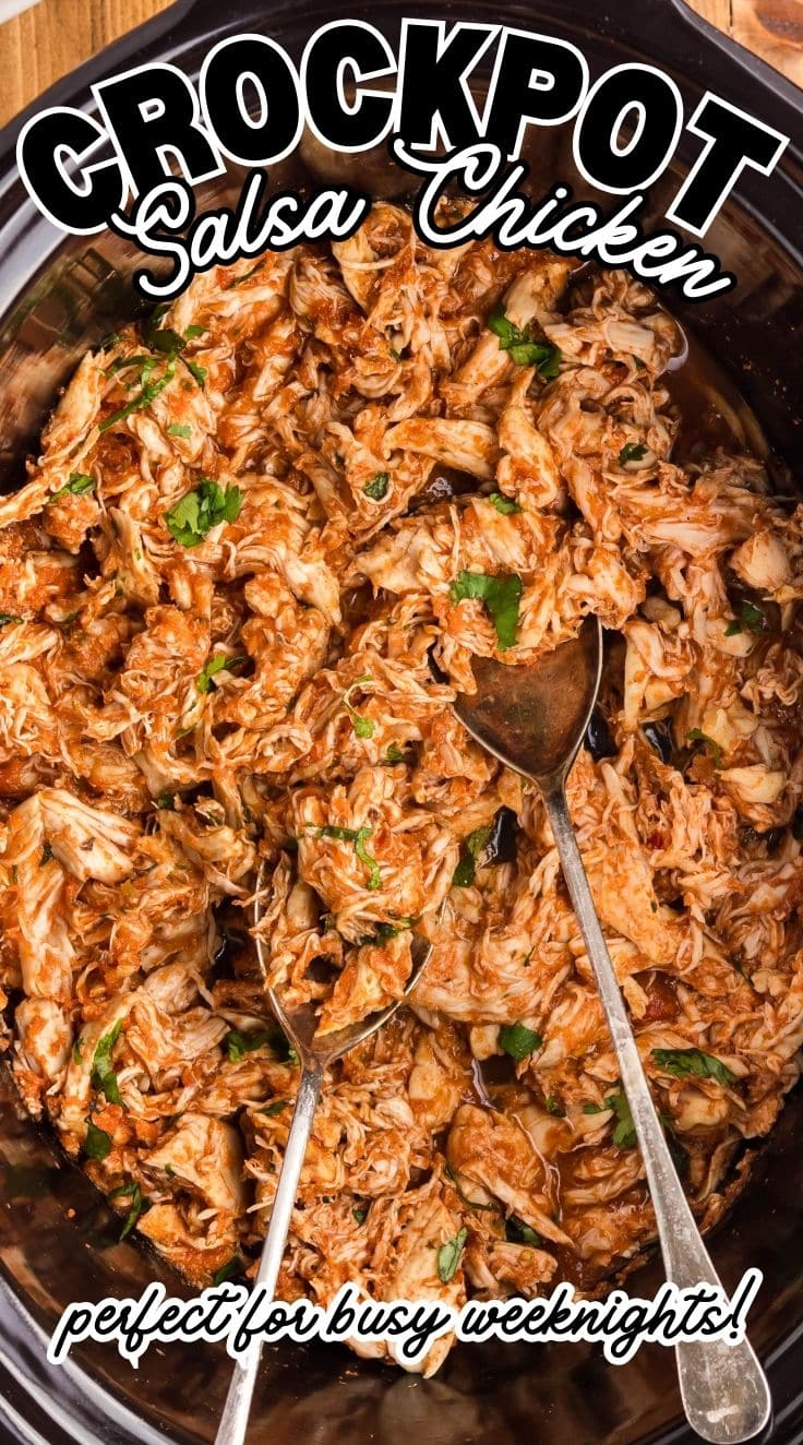 Top view of Crockpot Salsa Chicken with 2 spoons inside a crockpot
