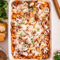 A warm meatball casserole baked with rigatoni pasta and gooey cheese on top.