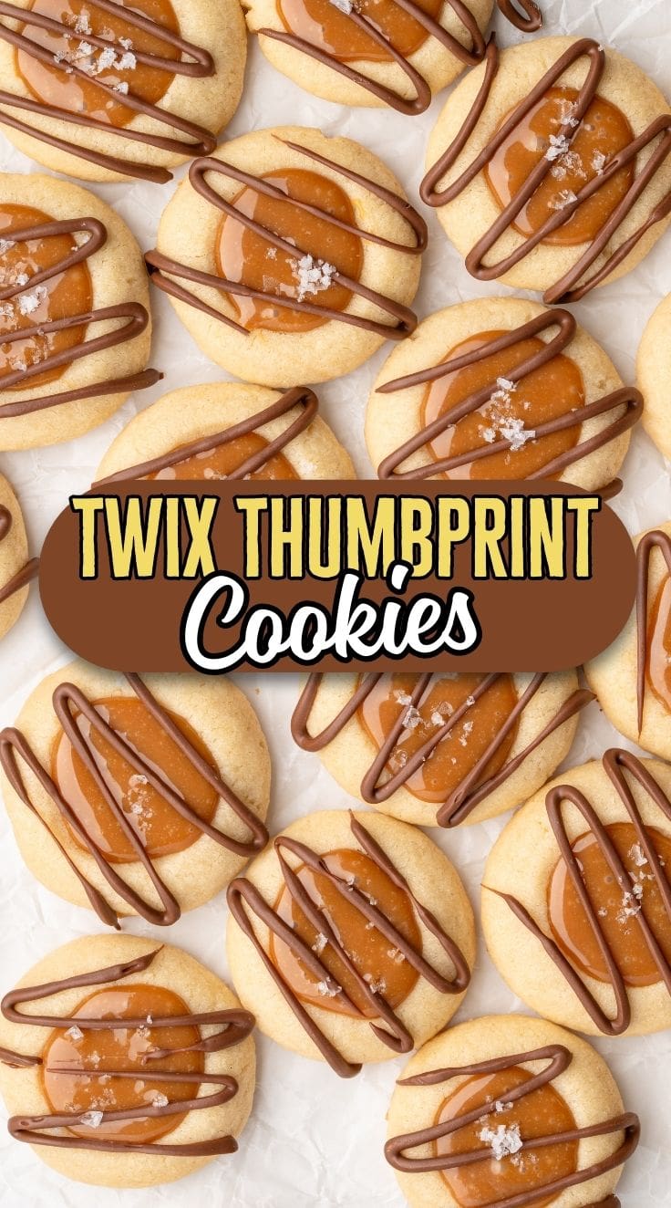 Top view of Twix Thumbprint Cookies laid on a parchment paper