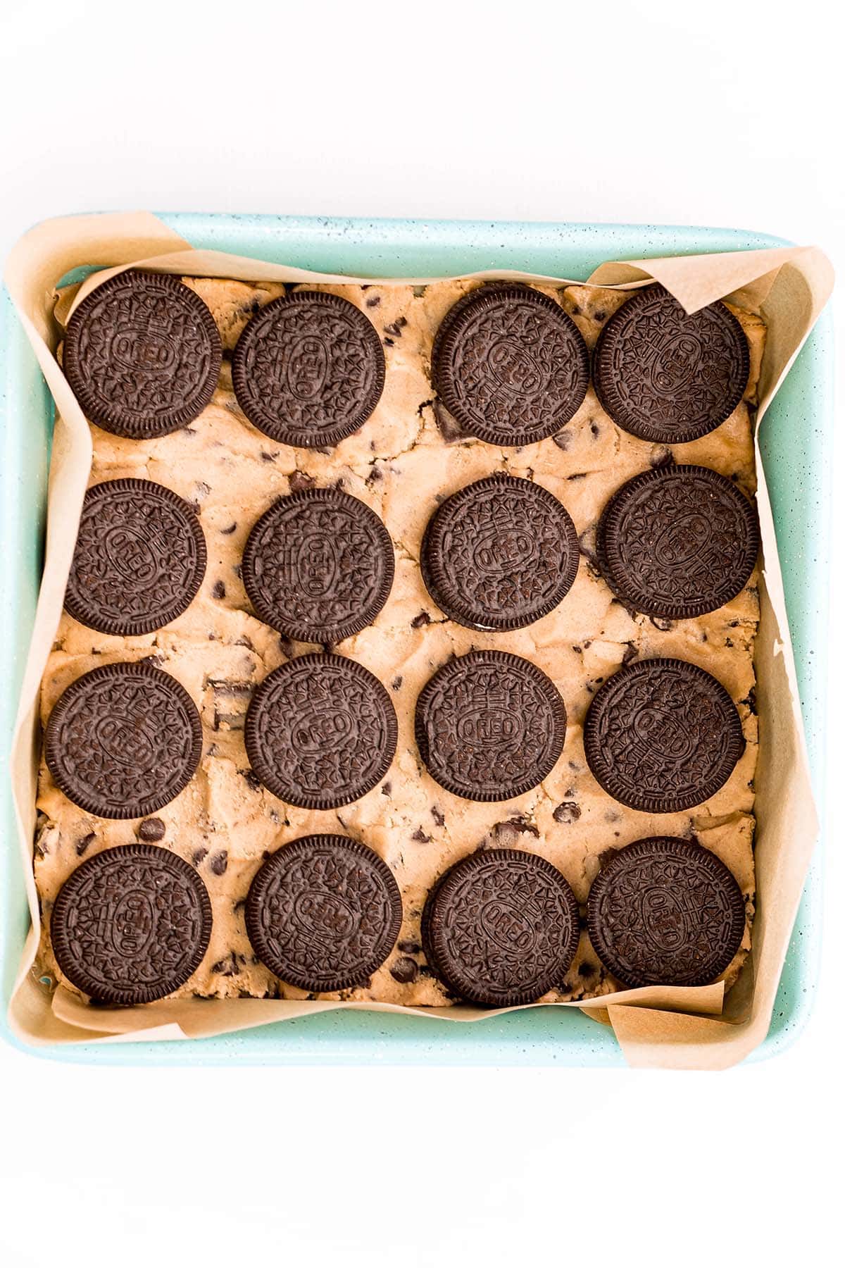 arrange the oreos on top of the cookies dough. 