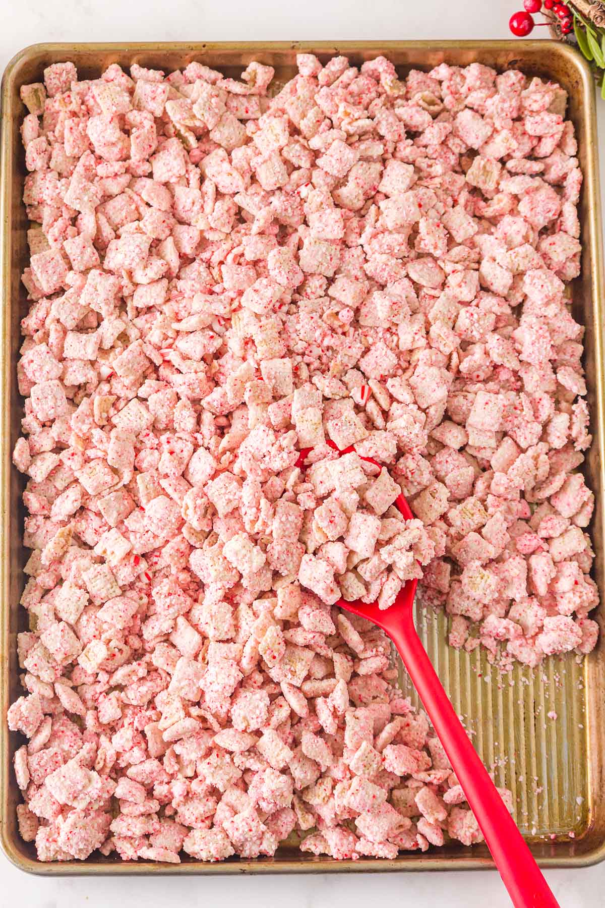 spred the muddy buddies in baking sheet. 